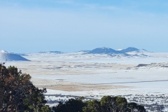 Capulin-Volcano-outer-wide-shot-of-snowy-mounds