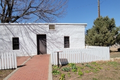 Centenial-Village-white-southwest-building
