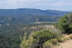 Chimney-Rock-National-Monument-green-hills-view