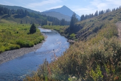 Crested-Butte-Lower-Loop-creek-leading-to-mountain