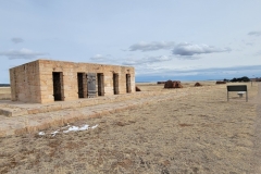 Hiking-Fort-Union-White-Brick-Building-East-Side