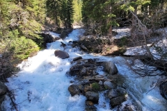 Gloria-Falls-river-near-falls