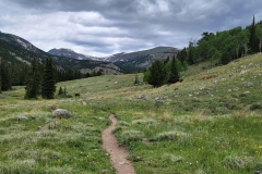 Jasper-Lake-trail-heaven-meadow-with-clouds
