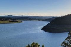 Trinidad-Lake-State-Park-lake-bend-with-hill-high-angle
