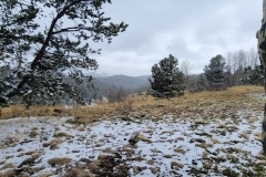 Mueller-Overlooks-Snowy-cloudy-ridgeline