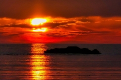 Sunset-Beach-Red-with-sun-flare-on-water