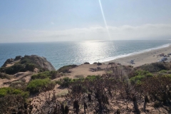 Point-Dume-sun-high-over-beach