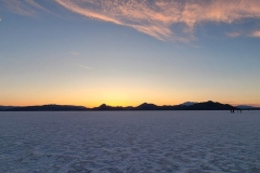 Salt-Flats-Sunset-high-sky-and-sun-behind-peaks