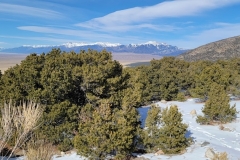 Zapata-Falls-Snowy-mountains-and-sand-dunes